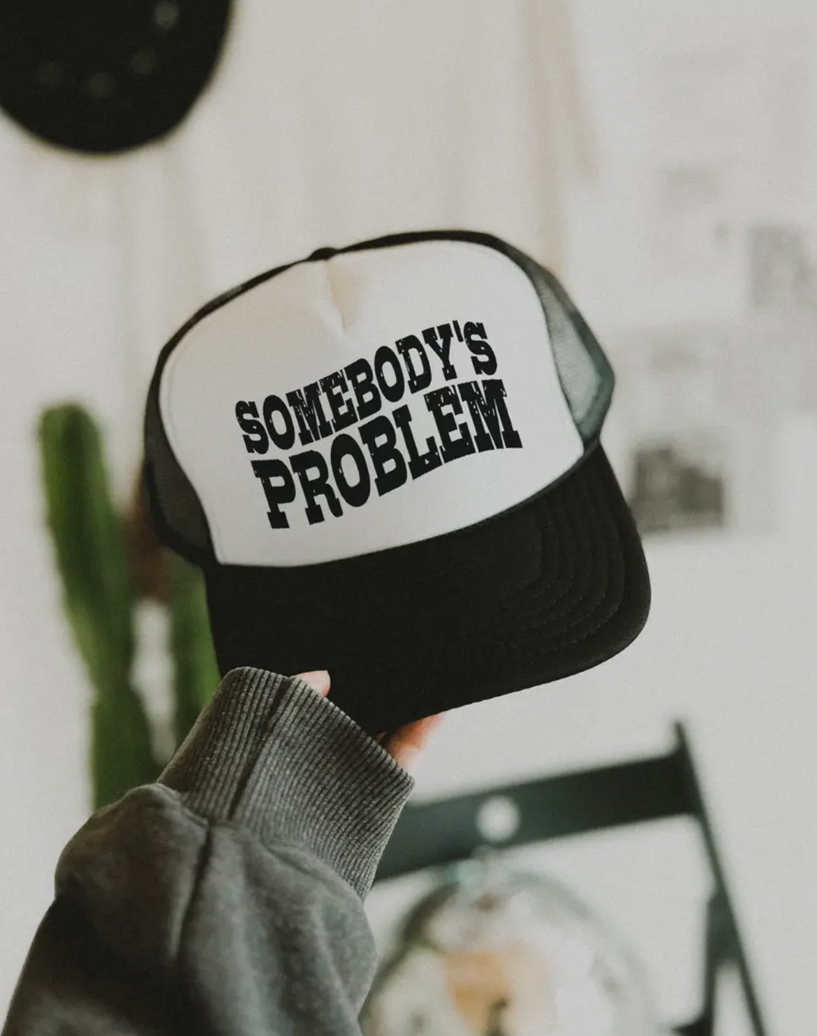 Somebody’s Problem Trucker Hat